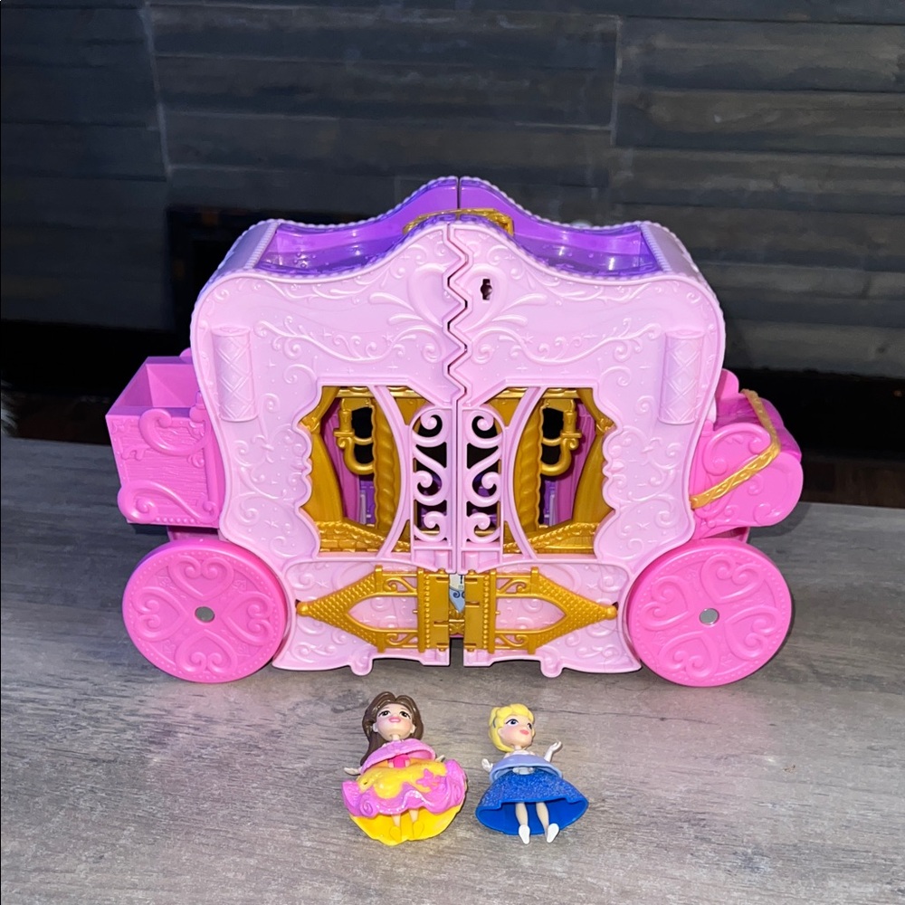 Disney Princess Carriage to Castle Transforming Playset, featuring two small dol